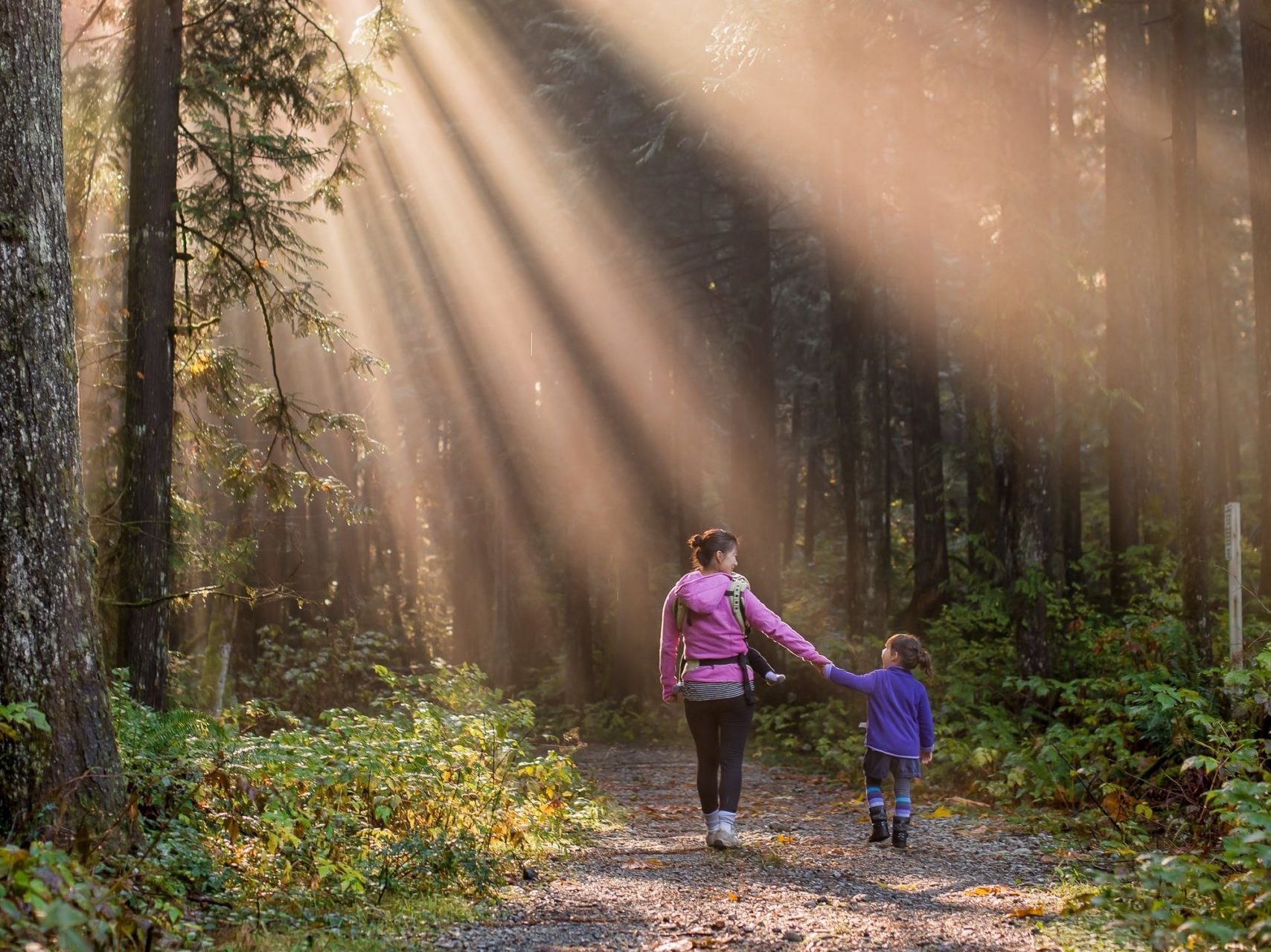 Mother walking with child
