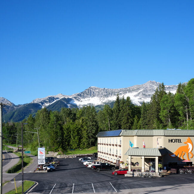 Exterior view of Fernie Fox Hotel and Hwy 3.