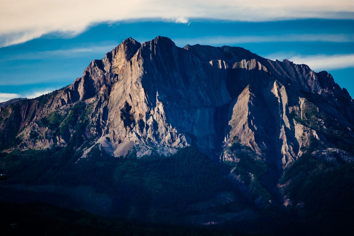 Stunning summer sunset over the mountains of Fernie.