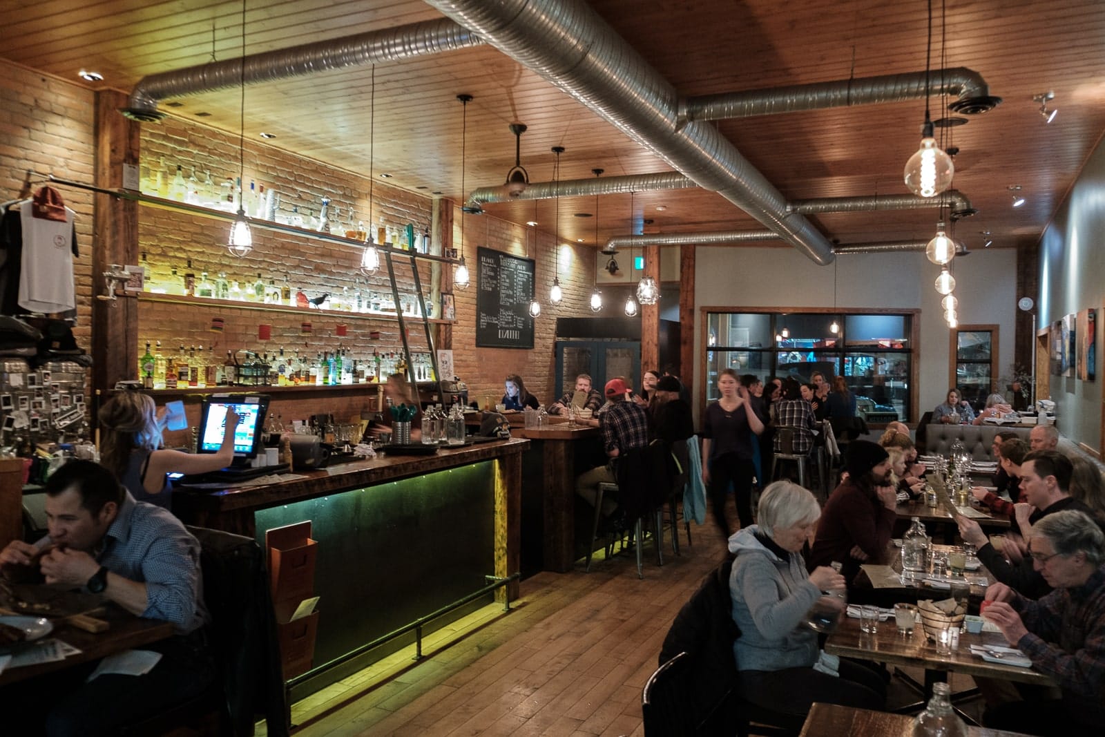 Dining at bar and grill in Fernie